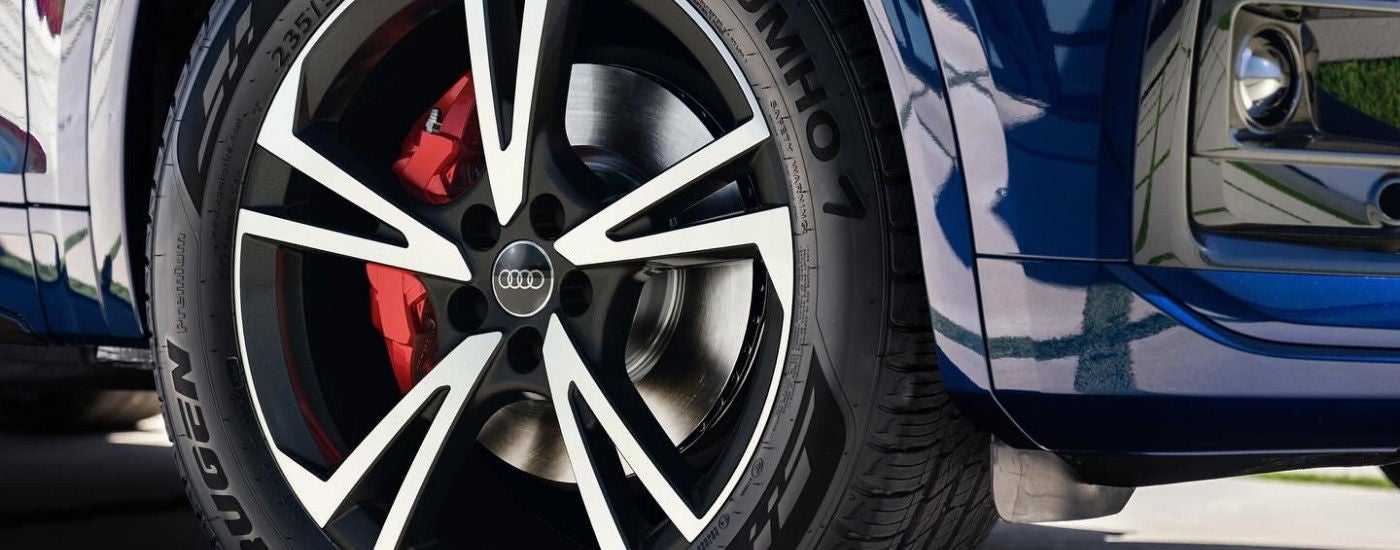 A wheel on a blue 2025 Audi Q5.